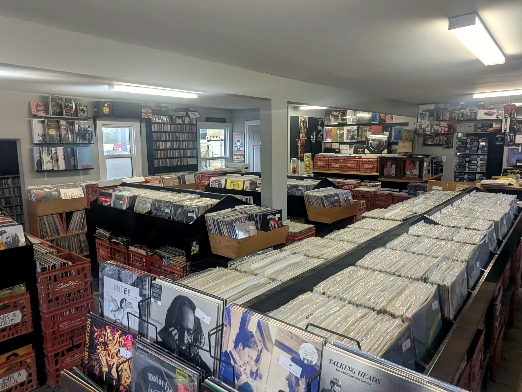 Rows of records and used stock inside Speed City Records