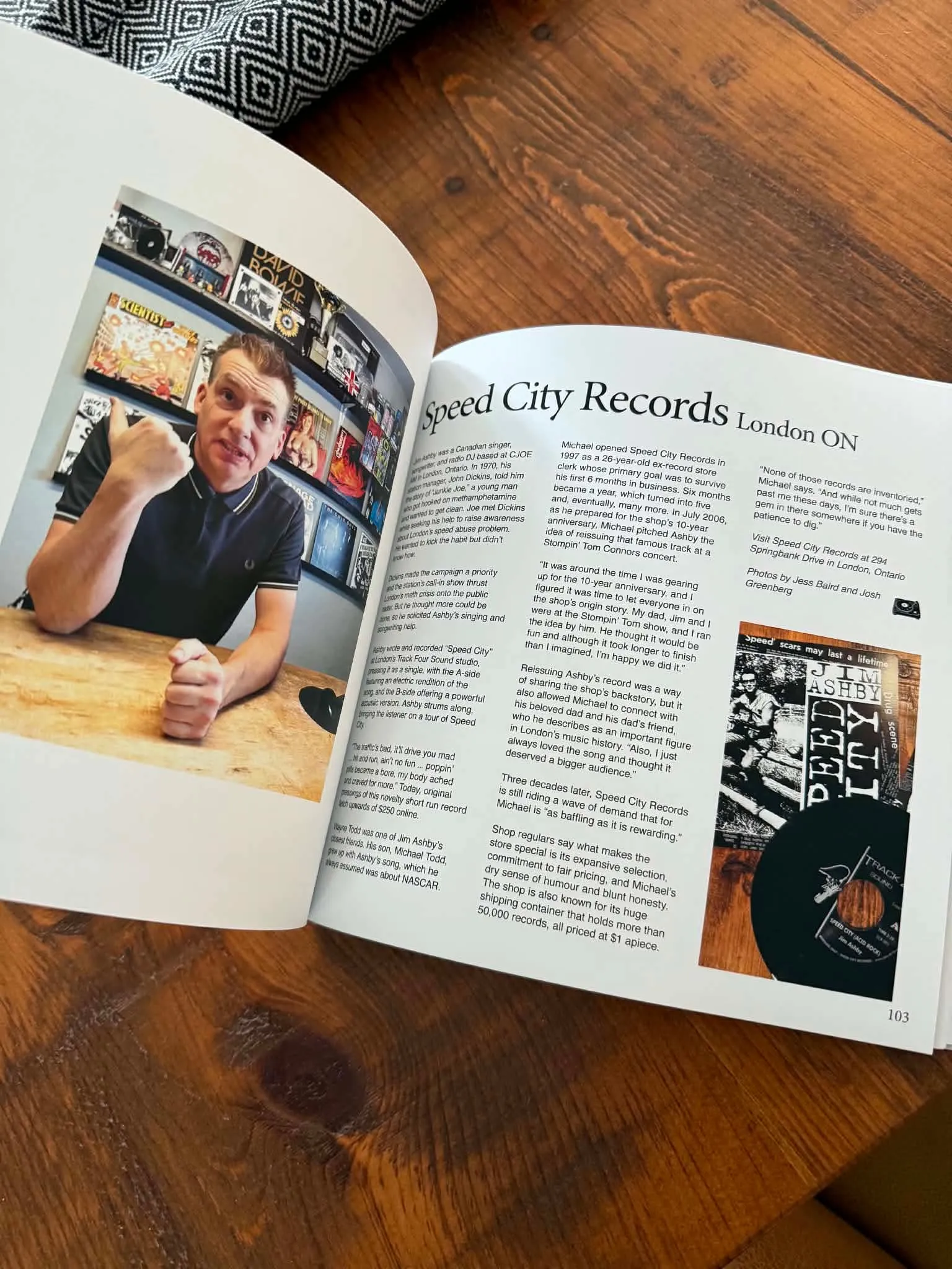 Open book showing Michael Todd in The Record Keepers beside the Speed City Records story